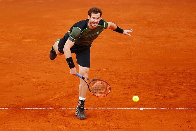 Andy Murray of Great Britain in action against Rafael Nadal of Spain in the Madrid Open final on Sunday