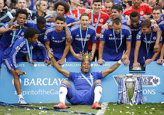 Chelsea celebrate with the trophy after winning the Barclays Premier League