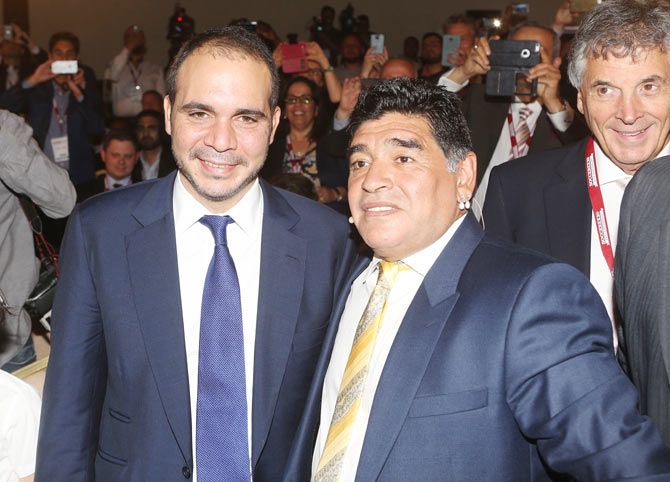 Jordanian Prince Ali Bin Al Hussein (left) with football legend Diego Maradona.
