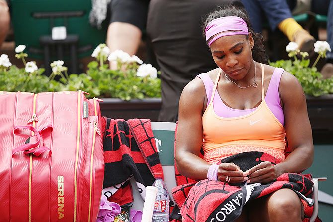 Serena Williams of the United States deep in thought during a break in play in her match against German Anna-Lena Friedsam on Thursday
