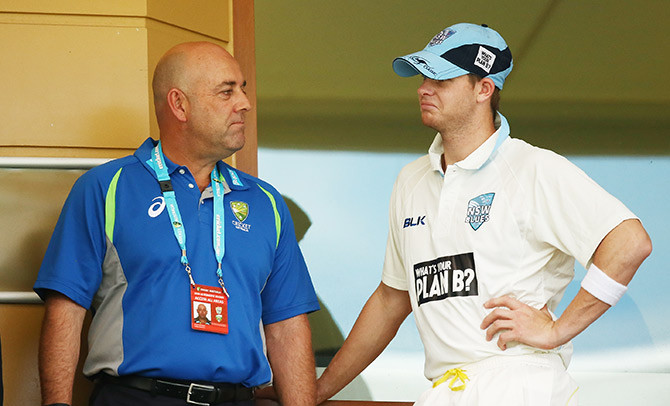 Darren Lehmann and Steven Smith look on during a Sheffield Shield match in Adelaide 