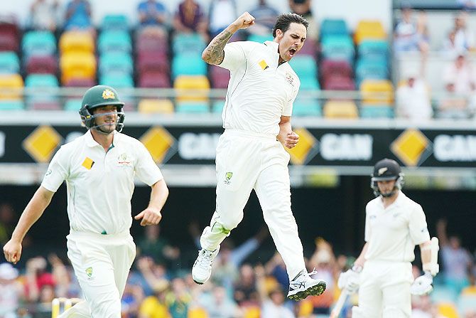 Australia's Mitchell Johnson celebrates with teammates after dismissing New Zealand's Ross Taylor