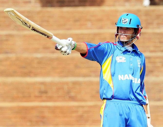 Namibia's Raymond van Schoor celebrates his 50 against Kenya during the ICC Mens Cricket World Cup qualifier at Wits University in Johannesburg on April 15, 2009