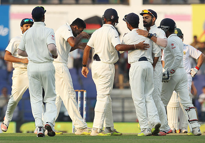 Ravichandran Ashwin of India celebrates the wicket of Stiaan van Zyl of South Africa 