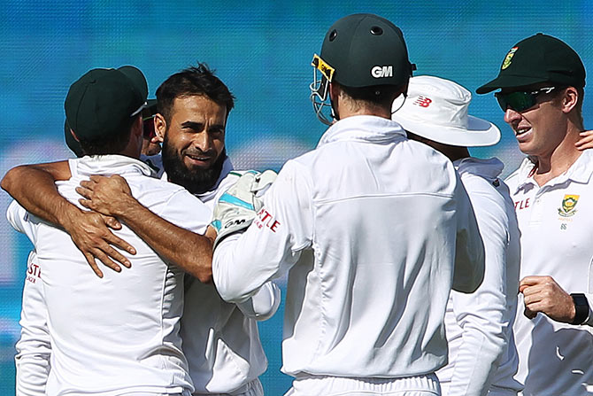 Imran Tahir of South Africa celebrates the wicket of Ajinkya Rahane of India 