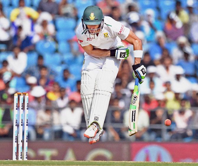 South African batsman Faf du Plessis tries to play a bouncer
