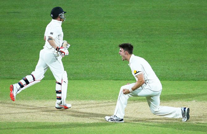 Australia's Mitch Marsh celebrates after dismissing New Zealand's Brendon McCullum lbw