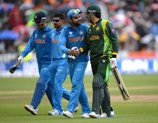 Virat Kohli of India shakes hands with Pakistan's Misbah-ul-Haq 
