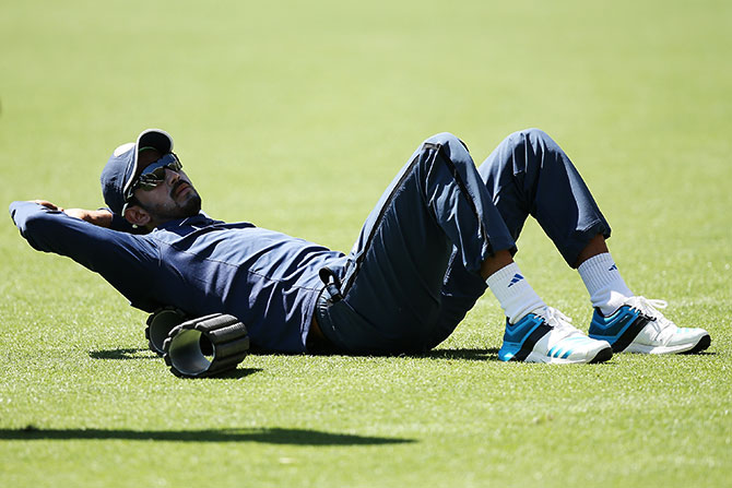 KL Rahul of India stretches during an India training session 