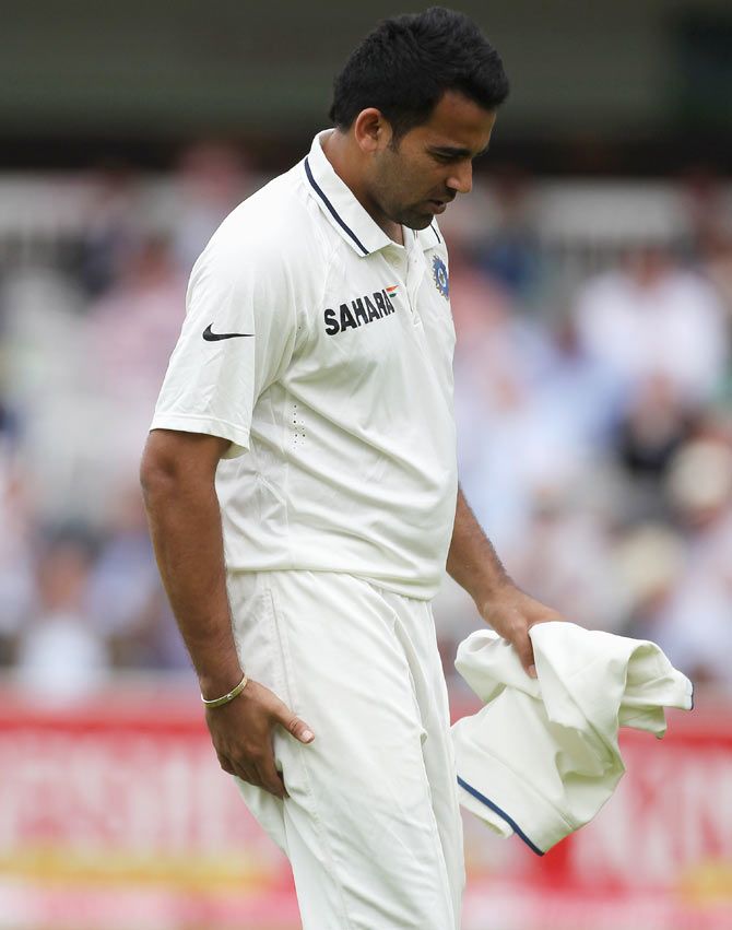 Zaheer Khan limps off with a hamstring injury
