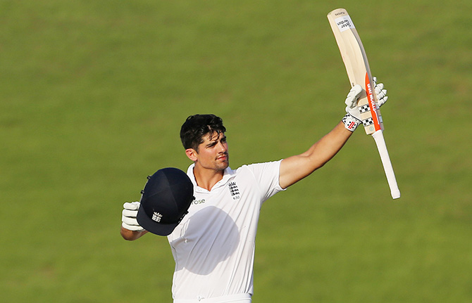England's Alastair Cook celebrates reaching 250 runs 