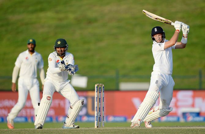 England's Joe Root bats in the 2nd innings of the 1st Test at the Zayed Cricket Stadium, in Abu Dhabi on Saturday