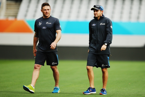Brendon McCullum arrives with New Zealand coach Mike Hesson 
