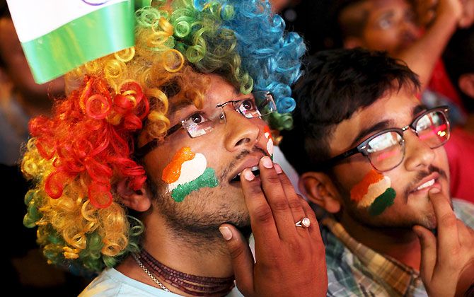 Indian cricket team fans from Chandigarh react as they watch their team lose to the West Indies in World Twenty20 cricket tournament semi-final on Thursday
