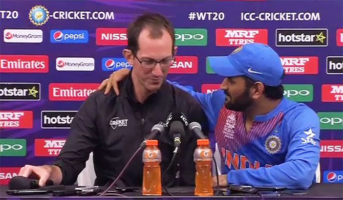 Dhoni counter-questions journalist Samuel Ferris at the post-match press conference in Mumbai on Thursday