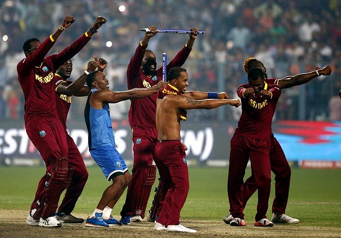 West Indies players celebrate after winning the World T20 final against England, in Kolkata on Sunday