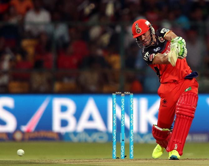 Royal Challengers Bangalore batsman AB de Villiers hits a boundary