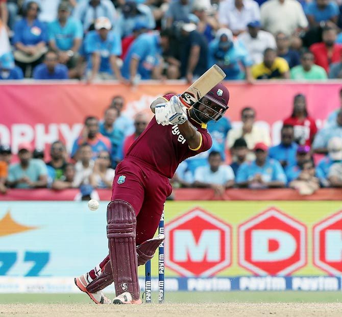 Evin Lewis hits out against India. Photograph: BCCI