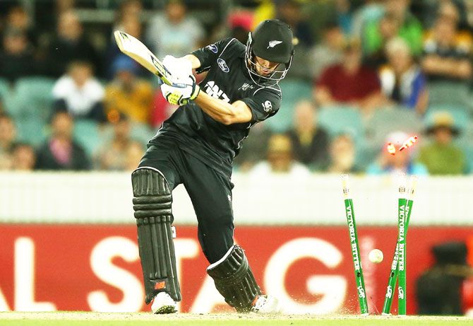 New Zealand's Mitchell Santner is bowled by Australia's Mitchell Starc during the 2nd ODI