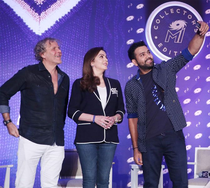 MI owner Nita Ambani and Renzo Rosso, Founder, Diesel and Rohit Sharma click a selfie at the event on Wednesday
