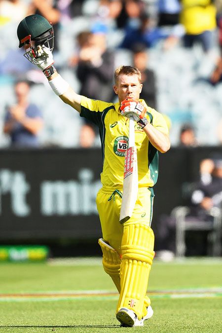 Australia's David Warner celebrates making a century during the 3rd ODI against New Zealand at Melbourne Cricket Ground on Friday