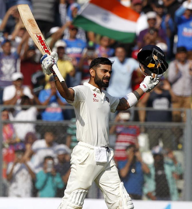 India captain Virat Kohli celebrates his century against England on Day 3 of the 4th Test at the Wankhede Stadium in Mumbai on Saturday