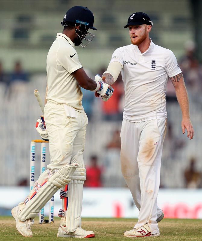 Ben Stokes congratulates KL Rahul as he makes his way back after his dismissal on 199