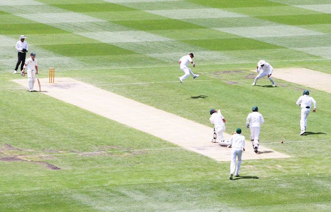 Pakistan's Yasir Shah celebrates the wicket of Australia's Matthew Renshaw
