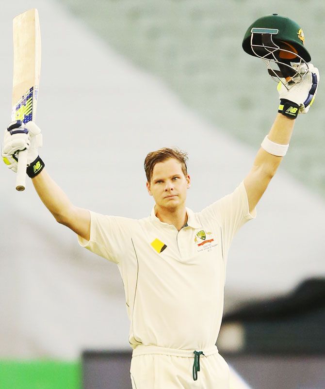 Australia's Steve Smith celebrates on completing a century against Pakistan on Day 4 of the second Test at Melbourne Cricket Ground in Melbourne on Thursday