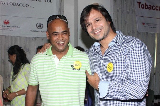 A file picture of Vinod Kambli with actor Vivek Oberoi