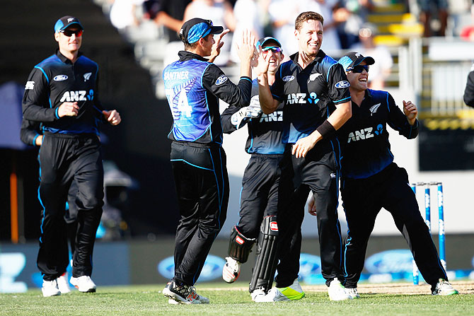 Matt Henry of New Zealand celebrates his wicket of George Bailey of Australia during the One Day International match