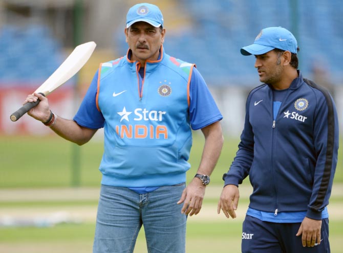 Indian Team Director Ravi Shastri (left) with captain Mahendra Singh Dhoni 