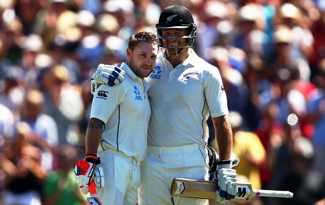 Brendon McCullum of New Zealand is congratulated by Corey Anderson 