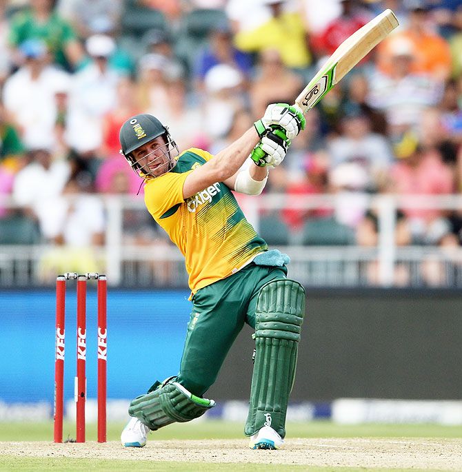South Africa's AB de Villiers hits a six during the 2nd KFC T20 International match against England at the Wanderers Stadium in Johannesburg on Sunday