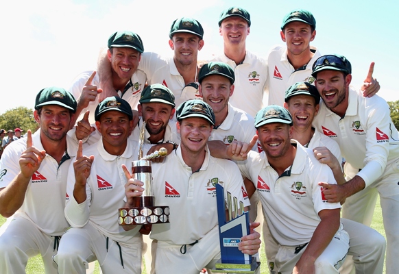 The Australian team celebrate with Trans Tasman Trophy 