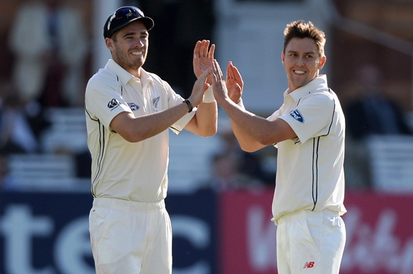 Trent Boult of New Zealand celebrates with Tim Southee  