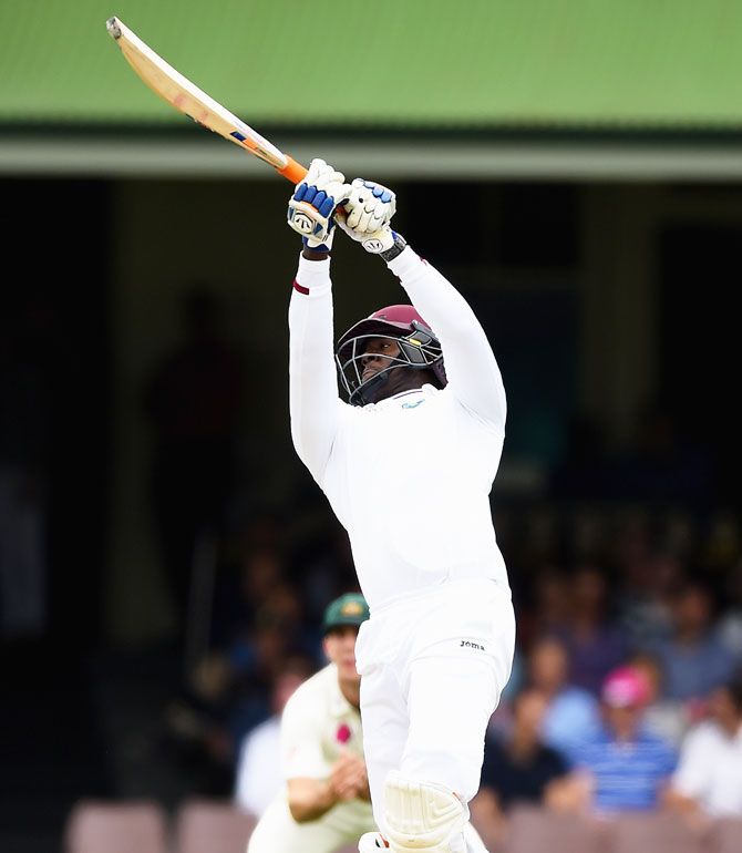 West Indies' Carlos Brathwaite heaves a delivery for a six