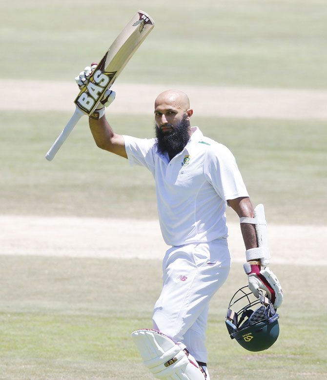 South Africa's Hashim Amla celebrates scoring a double century against England during the second cricket Test match in Cape Town on Tuesday