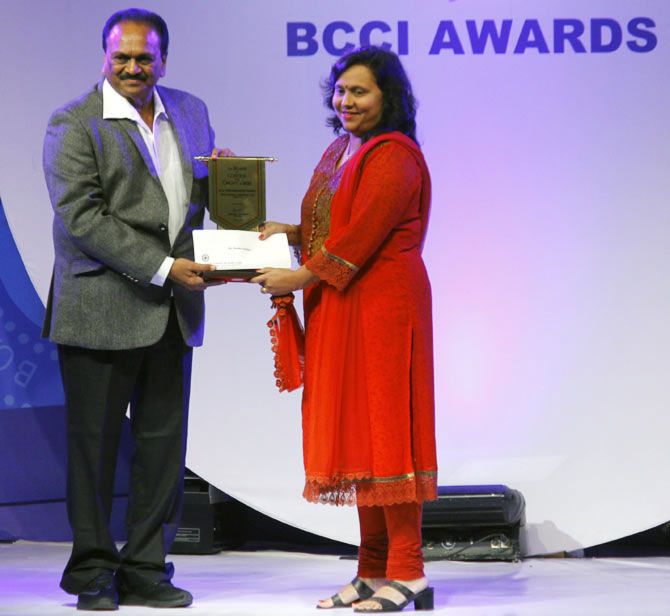 India's women's team captain Mithali Raj's mother accepts the Best senior woman cricketer of the year award on her daughter's behalf