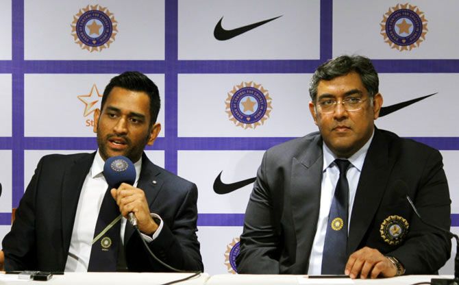 Team India captain Mahendra Singh Dhoni and Team India manager Kapil Malhotra during a media session in Mumbai on Tuesday