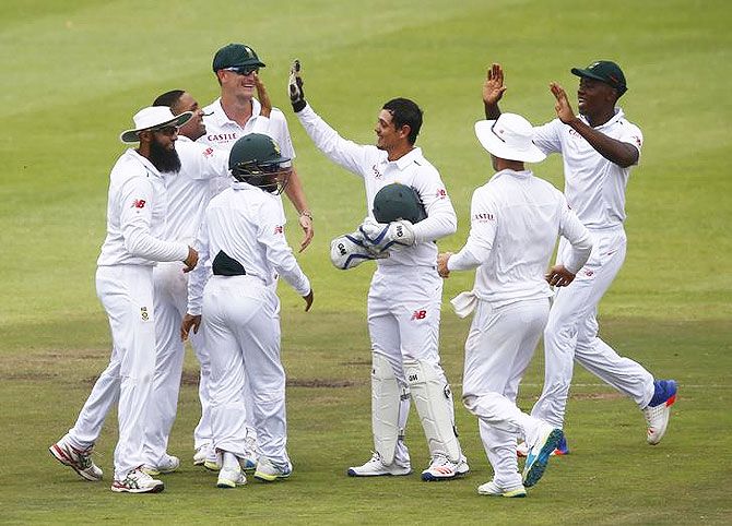 South Africa celebrate the wicket of England's Nick Compton