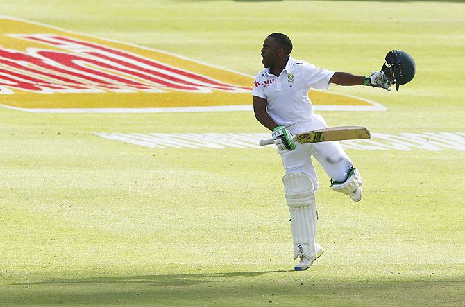 South Africa's Temba Bavuma celebrates scoring a century on Day 4 of the second cricket Test match against England in Cape Town, on Tuesday
