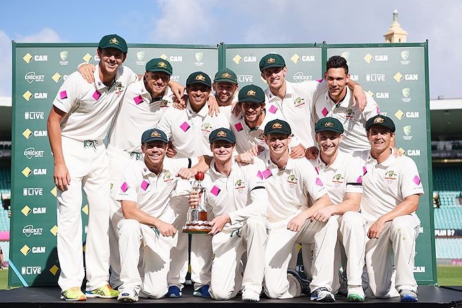 The Australian team pose with the Frank Worrell Trophy after winning the series against West Indies on Day 5 of the third Test match at Sydney Cricket Ground in Sydney on Thursday