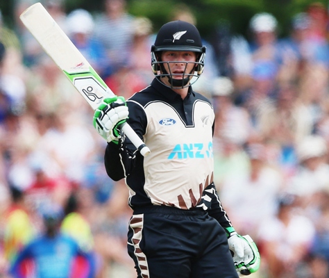 Martin Guptill of the Black Caps acknowledges the crowd after scoring fifty 