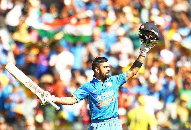 India's Virat Kohli celebrates his century against Australia in the 3rd ODI in Melbourne on Sunday