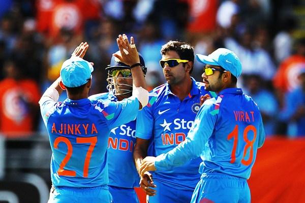 MS Dhoni of India celebrates with teammates Ravichandran Ashwin, Virat Kohli and Ajinkya Rahane 