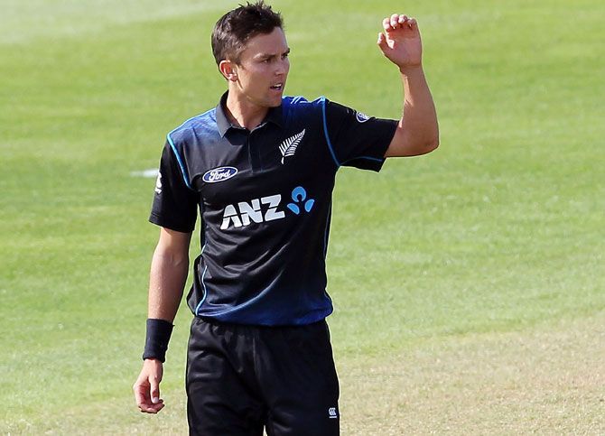 Trent Boult of New Zealand celebrates taking a wicket