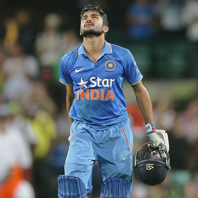India's Manish Pandey celebrates and acknowledges the crowd after scoring a century on Saturday