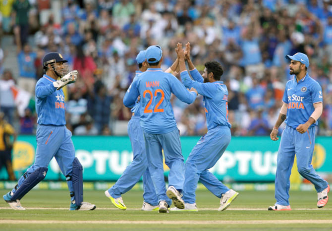 Ravindra Jadeja of India celebrates with team mates 