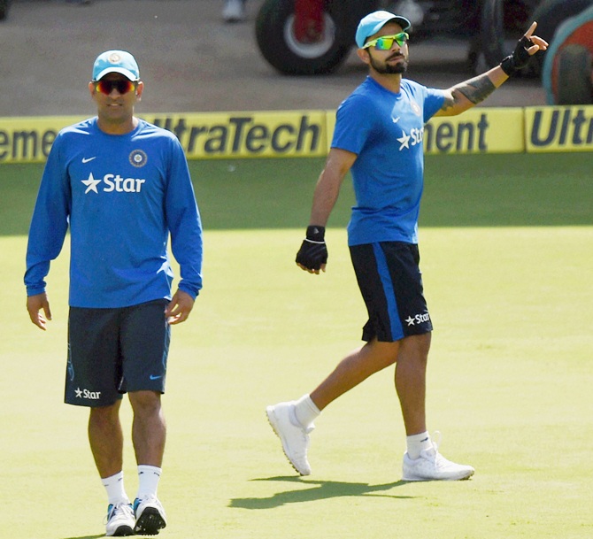Indian captain MS Dhoni and Virat Kohli during practice session 